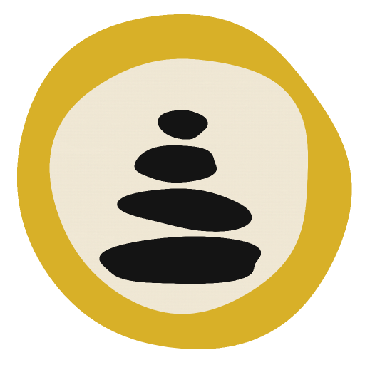 The Varden Games cairn: four stacked stones in a yellow ring